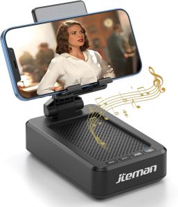Read more about the article Cell Phone Stand with Wireless Bluetooth Audio Speaker and Anti-Slip Base HD Surround Noise Perfect for Home and Outdoors with Bluetooth Speaker for Desk Suitable with iPhone/ipad/Samsung Galaxy